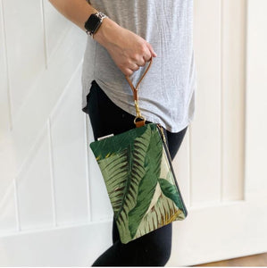 Wristlet with strap